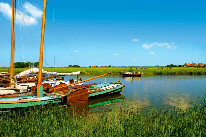   Travelling on the Friese Meren by motorboat
