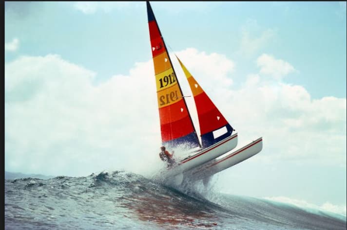   A Hobie 18 in the surf
