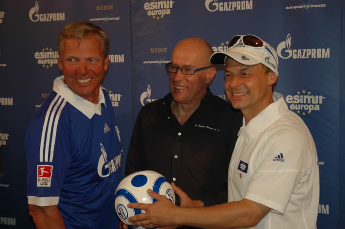   Skipper Jochen Schümann, "Esimit Europa 2" owner Igor Simcic and football world champion Olaf Thon