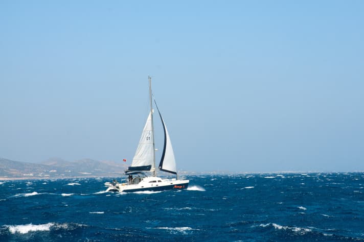 A Broadblue cat high on the wind. The sails are reduced in line with the increasing wind