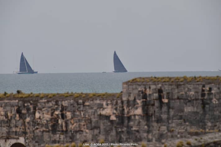   On Sunday, photographer Ricardo Pinto captured this historic image on the sidelines of the most modern sailing battle of our time: Two J-Class yachts can be seen off Bermuda, training for their regatta during the break between the challenger final and the 35th America's Cup match. The regatta crews on these yachts consist of more than 30 men and women - just six sail on the Cup bullets