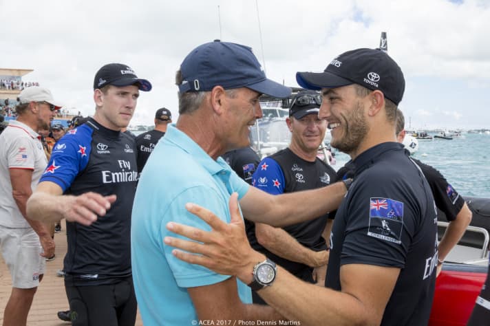   Russell Coutts congratulates his compatriot Blair Tuke on his Kiwi triumph