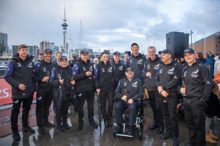   The sailors, team management, sponsors and supporters at the ceremony in Auckland. On the far left of the picture is 49er Olympic champion and Cup helmsman Peter Burling