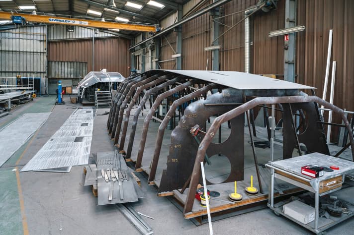 The aluminium panels for the fuselage are welded over a metal frame. The frames are added later