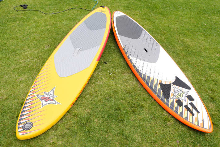 Inflatable board (left) and hardboard of approximately the same size.