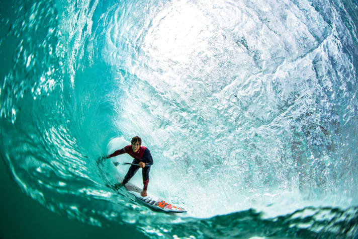 JP rider Keahi de Aboitiz relaxes in the "green room" - the VIP lounge for a select few wave SUPers.