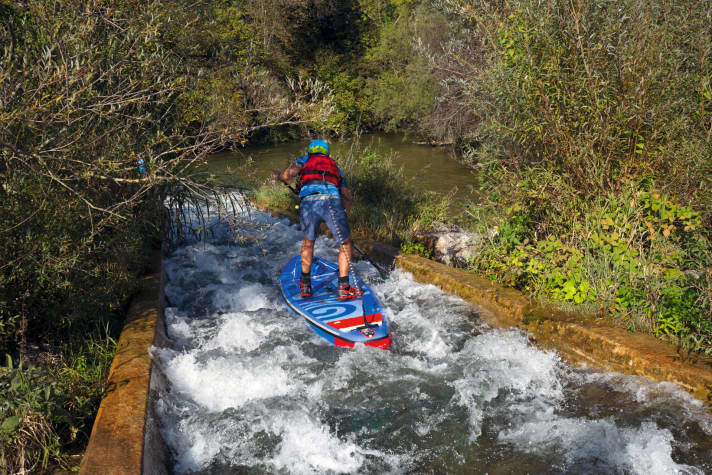 It's easy to transfer at the boat slide, but daredevils are tempted by the slide through the narrow alley.