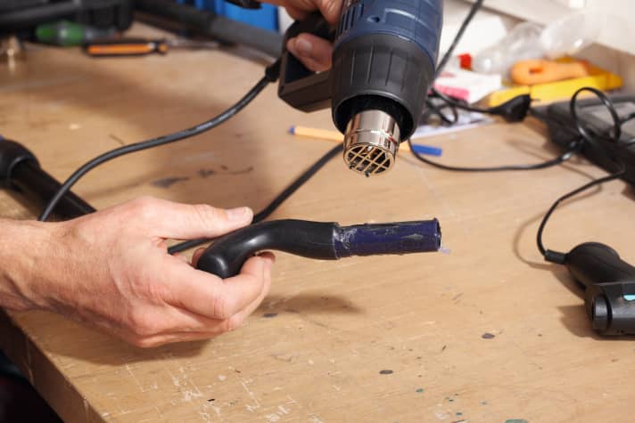 First heat the old adhesive residue, then scrape it off easily or spread it smoothly. Be careful with the hair dryer: use the lowest setting and keep enough distance.
