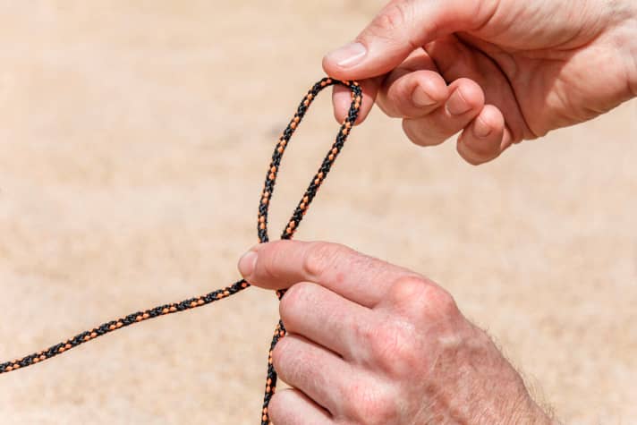Fold the loop upwards