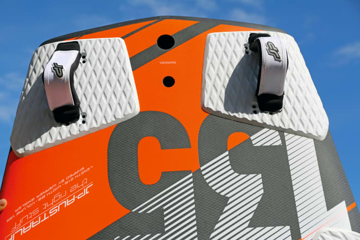   Extremely wide tails and loops positioned far outwards