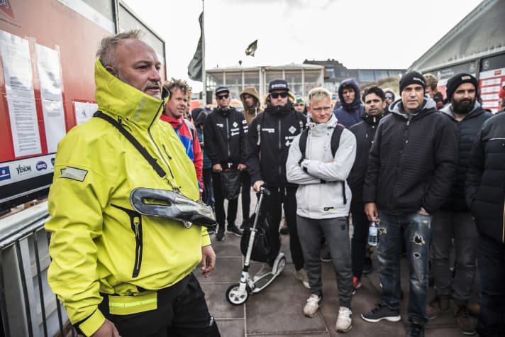 Skippers meeting in front of the notice board