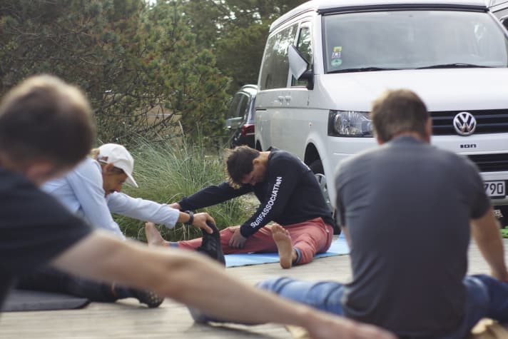 Staying supple despite tough daily loop training. Stretching sessions were part of the morning routine during the camp.
