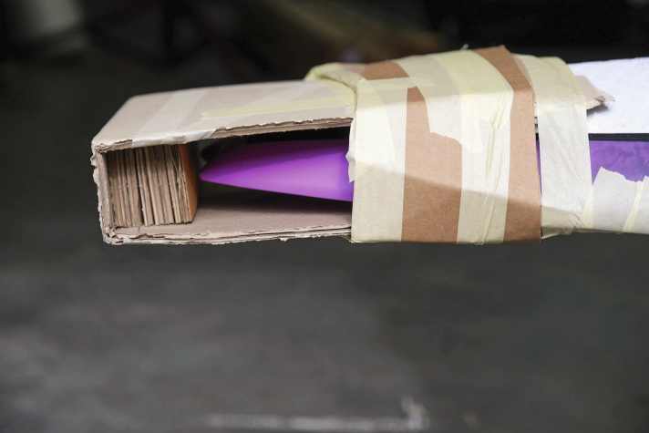 Effective impact protection can be taped to the board in two minutes using two pieces of cardboard.