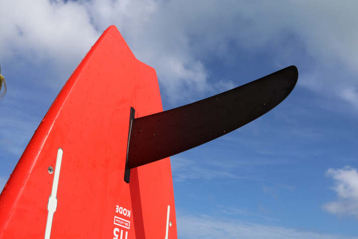 The single fin is positioned well forward in the starboard.