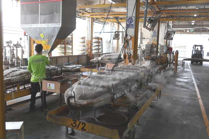 The core material is blown into moulds and expanded by steam