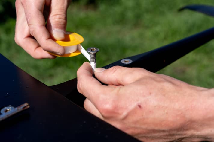 The Teflon tape should be wrapped thinly and tightly around the screw.