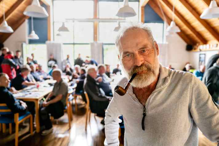 During the helmsmen's briefing, Krupinska answers the questions of the participating sailors