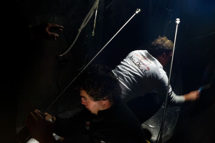   Under day: Pasting in the forecastle of Abu Dhabi