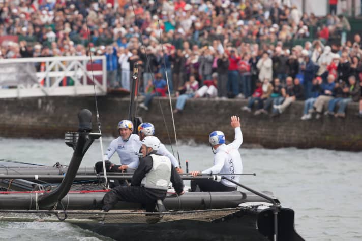   This is how winners wave: Spithill after winning the second race