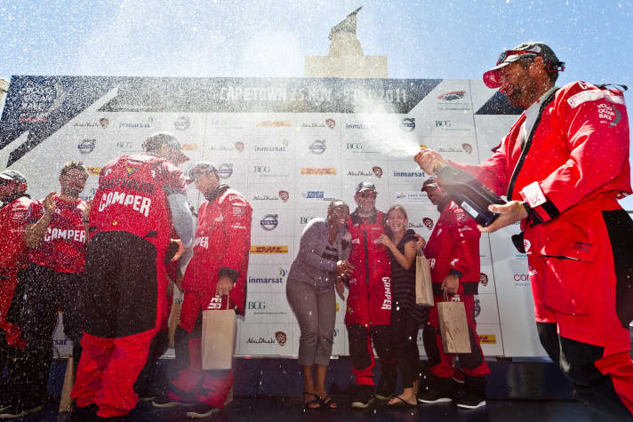   The crew at the obligatory champagne shower on stage