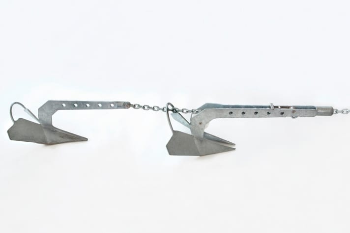   The first anchor of the tandem is permanently connected to the chain, the second is engaged as required