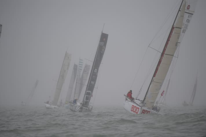   Drizzle and fog at the start of the 1350 nautical mile one-handed non-stop route
