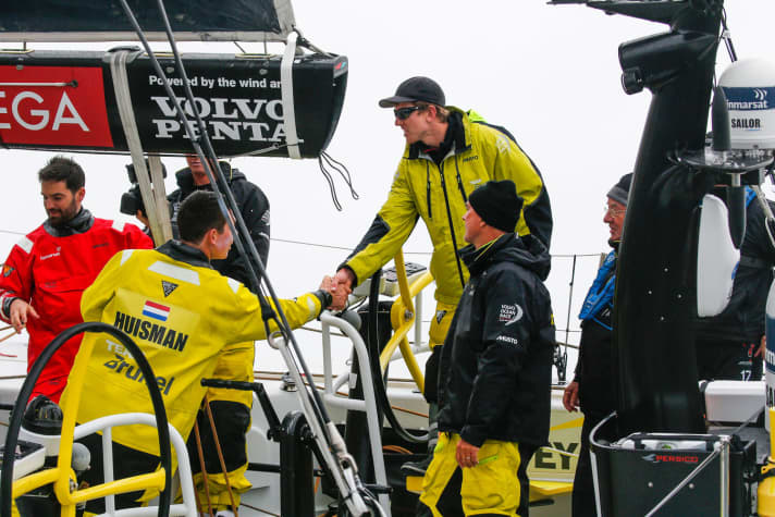   Brunel's helmsman Peter Burling commanded the respect of more than just his crew mates, such as Carlo Huisman here: the New Zealander steered the yellow boat around the course as if on rails