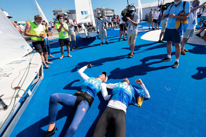   Happy with 470 silver: Swedes Anton Dahlberg and Fredrik Bergstrøm enjoy their success lying down