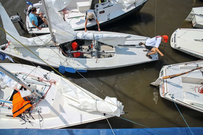   Lunch break on the river. The sailors go alongside the "Eureka" for lunch