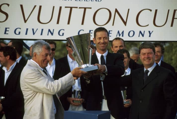   Prada boss Patrizio Bertelli and skipper Francesco de Angelis receive the trophy