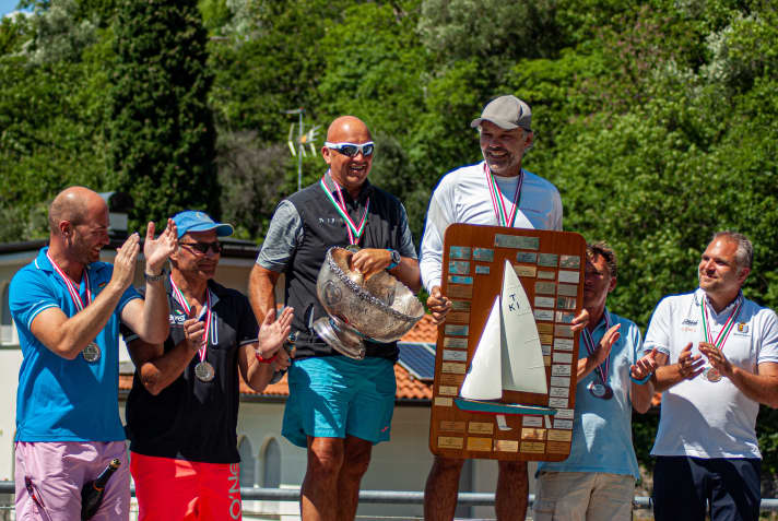   Tempest World Champion for the second time: Markus Wieser with the Champions plaque in his hands and Thomas Auracher with the silver pot