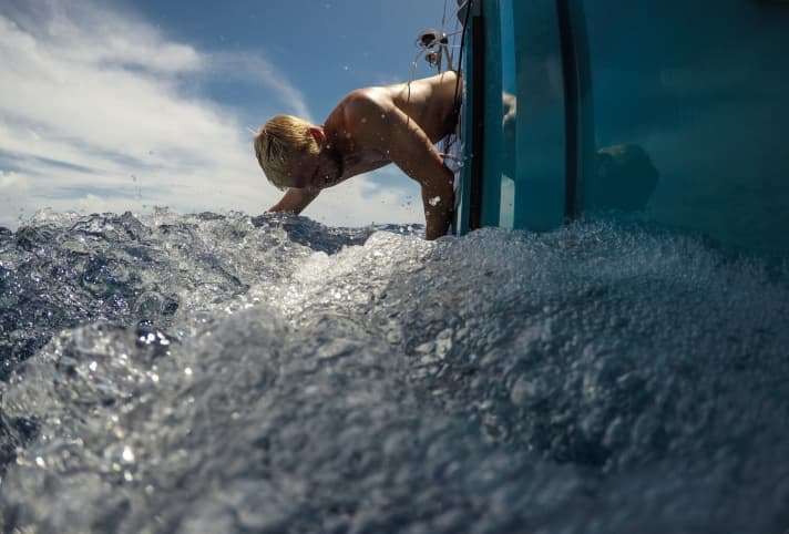   AkzoNobel's watch leader and helmsman Nicolai Sehested fights the seaweed