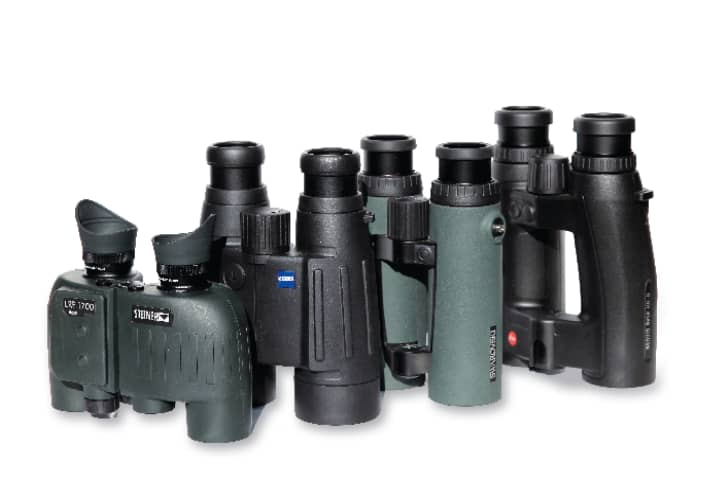   Four binoculars with integrated rangefinder from Swarovski, Zeiss, Leica and Steiner