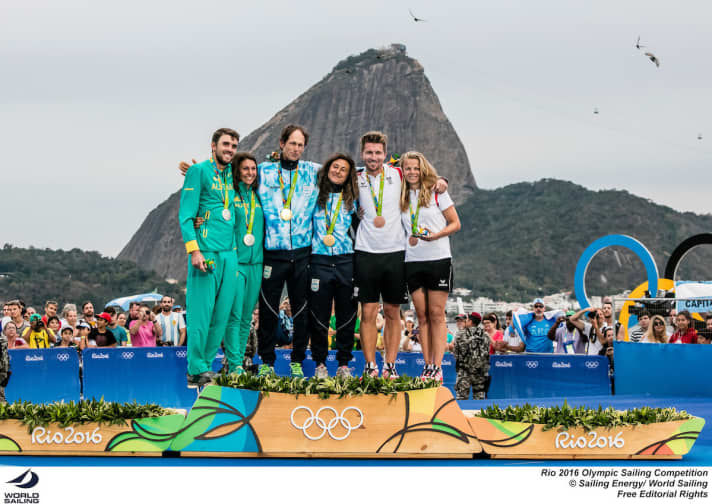   Here, the 2016 Nacra17 Olympic champions and medallists are celebrated in front of the Sugarloaf Mountain in Rio