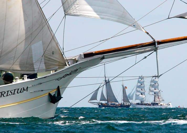When Kiel Week is on, the fjord is packed. Traditional skippers and sportsmen are on the water