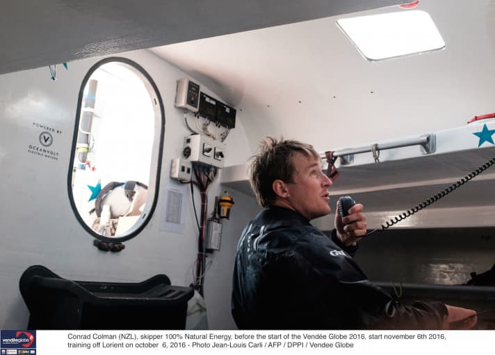   A radio call that hurts: Conrad Colman has to inform his shore crew about the mast breakage shortly before the finish line