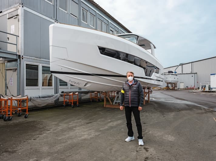 Jens Gerhardt with the appropriate protective mask on
 	the company premises in Greifswald