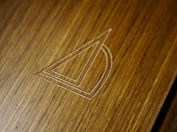   From Hanse with Love: Milled logo in the chart table of the Dehler 38