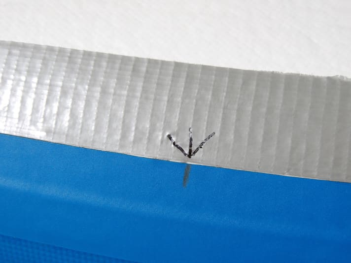 Then mark the position and tap the board (2).