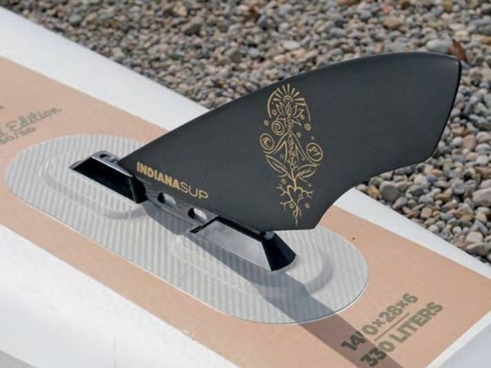 The Indiana Touring Race fin sits in the split fin box. This makes it easier to roll the board in.