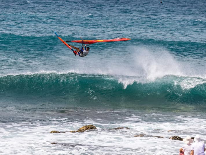 Eyes closed and through: Liam Dunkerbeck over the rocks of Ponta Preta