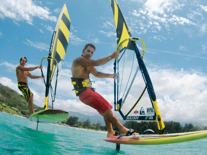 Foiling with boss Robby Naish: "Robby talks his way in everywhere," says Schweiger.