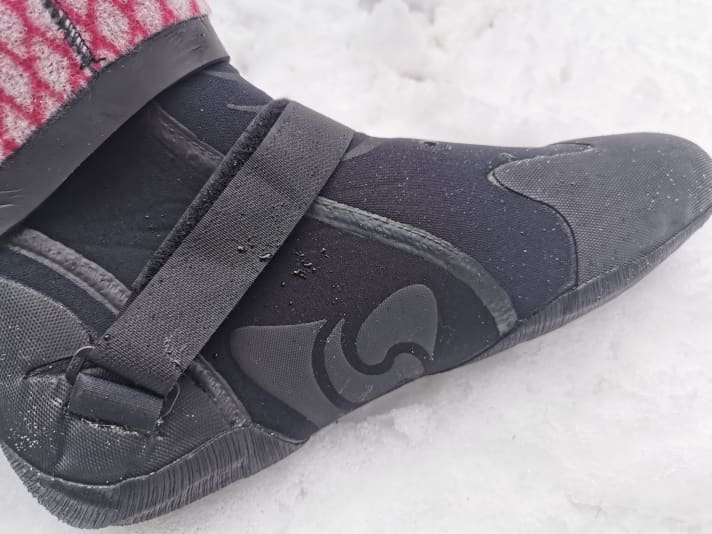 The Velcro was sewn on the inside far back