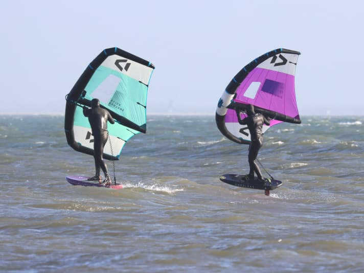 Slick (left) vs. unit - the latter has more span and profile as well as a different grip system