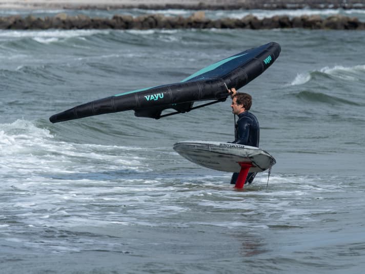 The board should always be held firmly when leaving the water.