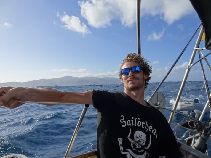   Lennart Burke at the tiller of the IW-31 "Andiamo"