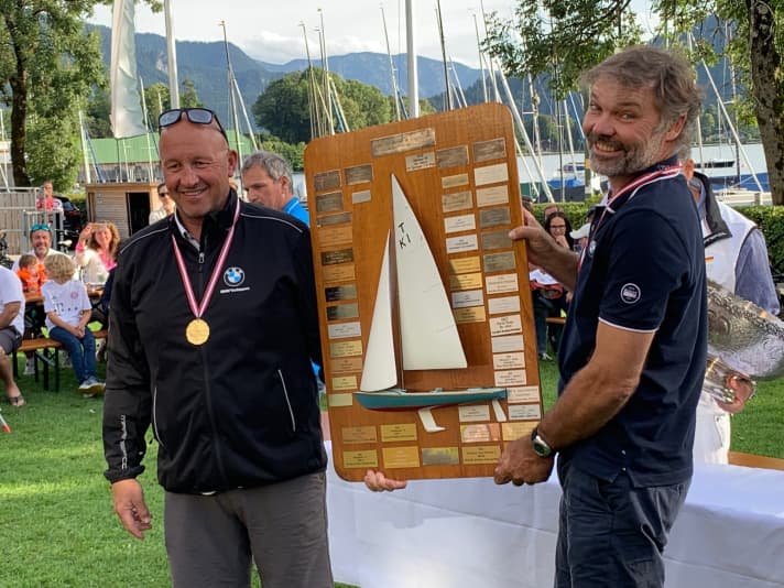   Tempest world champions Markus Wieser and Thomas Auracher with the historic Tempest plaque of all world champions, on which their names will soon also be displayed as title holders