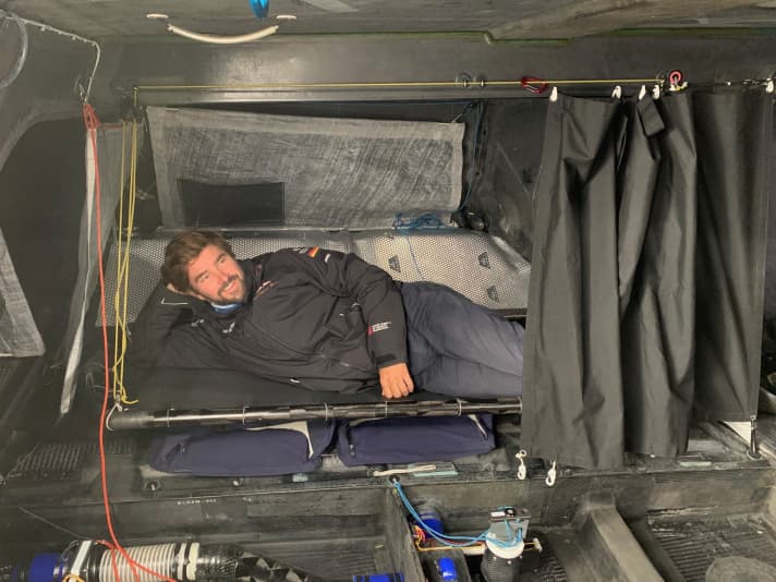   Soon to be his home for more than two months at sea: Boris Herrmann in the bunk of his "Seaexplorer - Yacht Club de Monaco"
