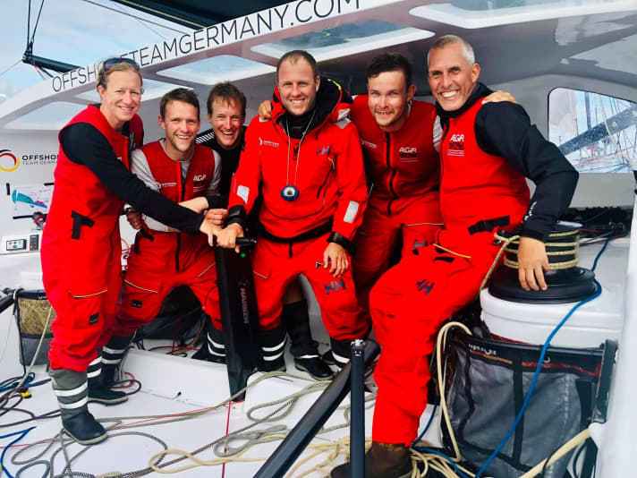   The Offshore Team Germany around skipper Robert Stanjek (3rd from right) in the harbour of destination in Plymouth