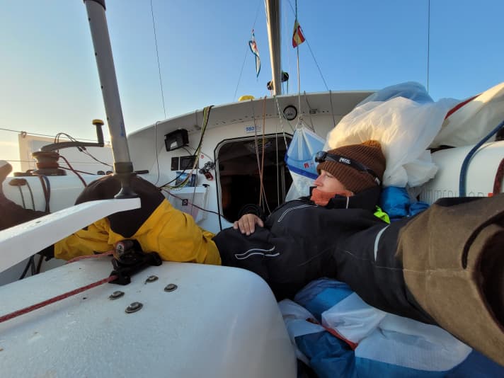   In the worst doldrums, the spinnaker even had to be lowered because old swell was causing unrest - an opportunity for a nap on board Lisa Berger's "Mojo"
